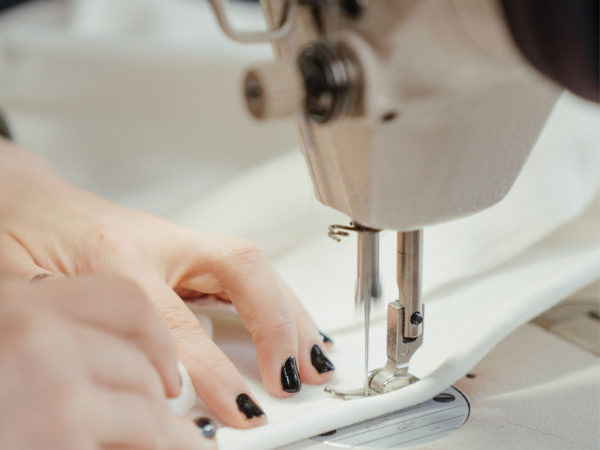 woman-sewing-black-finger-nails-600x450__35995